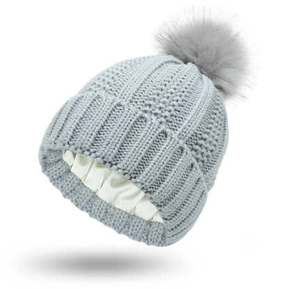 Luxury Satin-Lined Winter Beanie with Faux Fur Pom